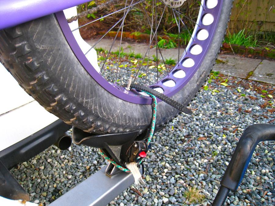 fr4 - a purple bike with a white dot on the front wheel